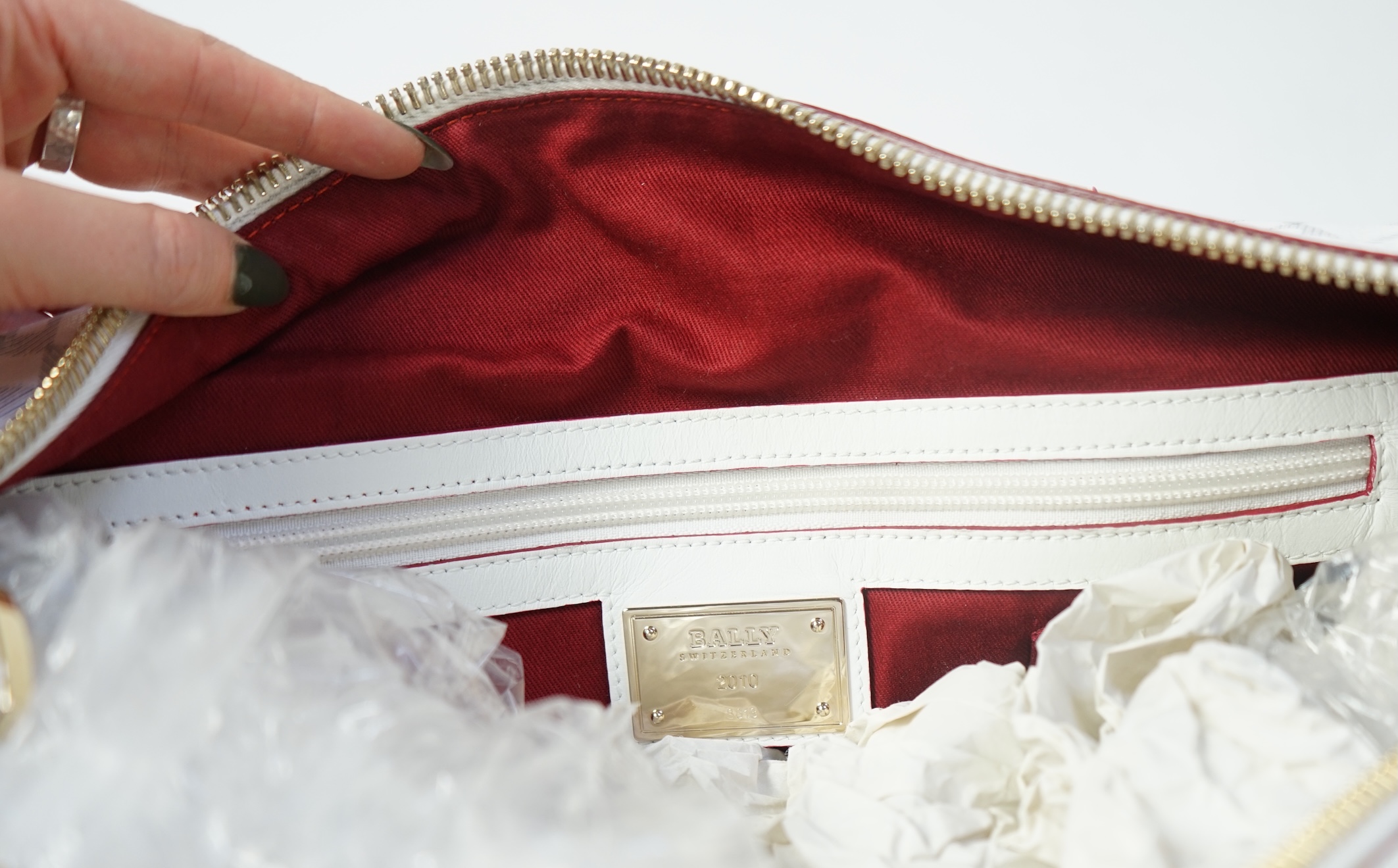 A large white monogram Bally weekend bag 'Berlinda' with red tiger detail